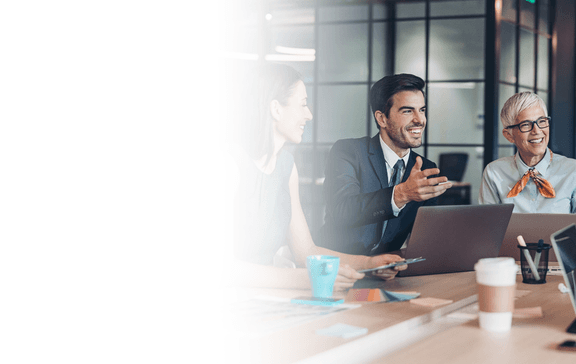 Executives reviewing decision intelligence outcomes